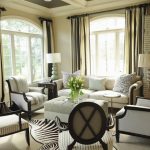 interesting living room idea with zebra motif rug also elegant white sofa and animal print cushion with wide stripe curtains in large carpeting concept