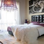 wonderful feminine bedroom for contemporary house with wonderful furry bedsheet also beautiful pinky chandelier with amazing leather beadboard with abstract painting on the wall