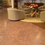 brown solid epoxy painting for basement floor a set of cozy and luxurious living room furniture with log tree legs table a round-shape carpet for living room
