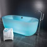 modern-coolest-nice-adorable-colored-bathtub-with-cyan-color-concept-with-glowing-in-the-dark-design-with-black-wall-and-flooring-tiles