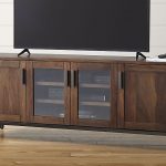 a media console with centers glass door cabinet for organizing the items inside and other two regular cabinets