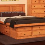 elevated platform bed with drawer storage underneath plus wooden night stand and chest of drawers combined with brown rug on wooden flooring bedroom ideas
