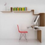 modern minimalist computer desk equipped with floating bookshelf a red chair