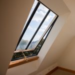 unique window idea with glass panel for attic