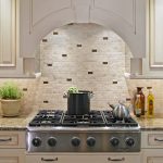 White brick backsplash tiles for kitchen in country style marble kitchen counter modern gas stove unit white cabinetry