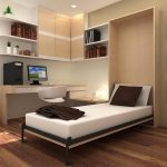 elegant cream bedroom idea with wall storage design and floating desk and wall photo gallery and hardwood floor and murphy bed chicago
