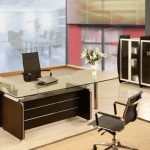 stunning brown modular desk for modern officewith glass top aside large storage with stylish swivel chair