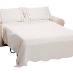 Cozy double bed sofa with white pillows