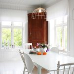 Higher corner wooden hutch idea for a dining room a set of dining furniture in white theme a decorative pendant lamp