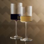 big size and medium size square wine glasses idea on bar table with chevron patterned bacsplash
