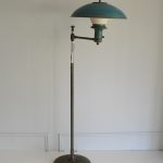 classic turquoise floor lamp made of metal on its post and base for traditional or classic home style