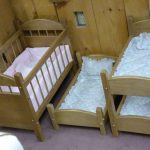 triple styles crib size bunk bed design with single and twin model before wooden wall