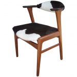 vintage designed cow print chair idea with wooden frame and minimal backrest with no armrest