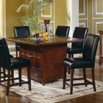 Glass And Wooden Kitchen Table Set And Black Chair On Best Rug