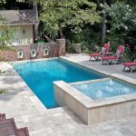 Triple Water Fountain Of Pool With Awesome Style And Red Pool Chairs