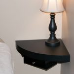 floating-corner-shelf-from-Lowes-as-black-nightstand-features-a-black-dresser-valet-underneath-the-nightstand-for-extra-storage