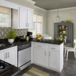 simple black gray and white color kitchen paint idea with white wooden cabinetry and gray storage and backsplash