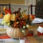 Elegant Fall Center Pieces Of Flowers With Pumpkins And Small White Candles