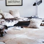 amazing furry cushion style for sofa design with animal print throw and area rug and unique wall lamp and wall decal