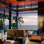 exotic interior of modern beach house design idea with wooden ceiling and evening hue sofa and wooden coffee table and open plan and glass window