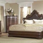 A fancy bedroom set idea with dark brown bed frame plus headboard a larger bedside table a bedroom vanity with mirror and table lamp white bedroom rug