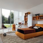 adorable bedroom design with open plan and yellow bedding and yellow built in bookshelves and area rug