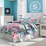 colorful bedroom design with boho chic comforter idea and blue wall paint and tufted simple headboard