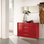 elegant red small console table for hallway design with drawesr and indoor plant and open plan room
