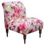 playful floral patterned pink accent chair idea with carved wooden legs and armless