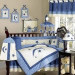 Teddy Bear nursery room theme idea with wood baby crib a wood side table a modern table lamp with white lampshade decorated with blue stars