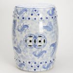 White and blue garden stool with fish pictures