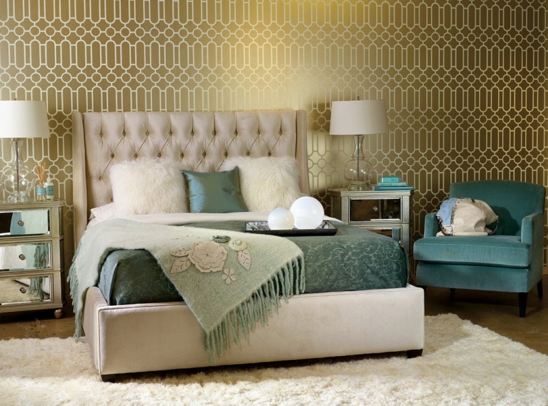modern bedroom idea gold toned wall with patterns bed frame with tufted headboard blue bedding treatment white shag rug two bedside tables with drawer system table lamps