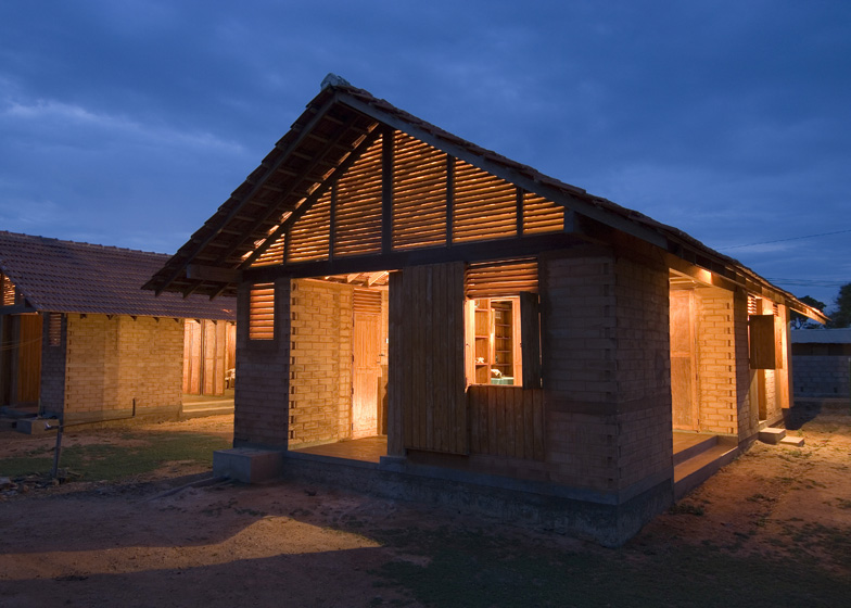 affordable house design built from compressed local wood for walls and coconut wood for roof