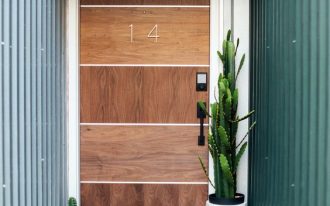 wood front door in modern minimalist style