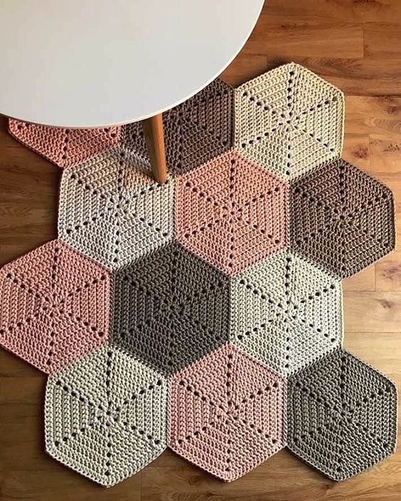 soft colored crochet rug in asymmetric shape