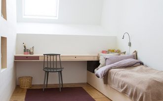 attic kids' bedroom idea single bed frame built in study desk black chair purple rug with fringe trims on both edge sides