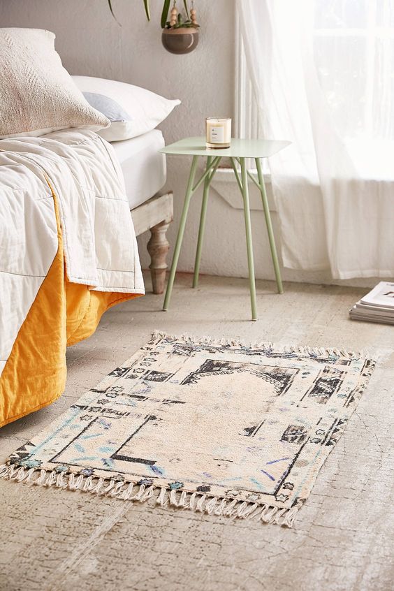 smaller area rug with tassels