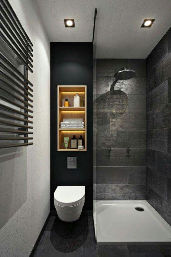 walk in shower with black walls and white flooring system recessed shelving unit with hidden lamps floating closet