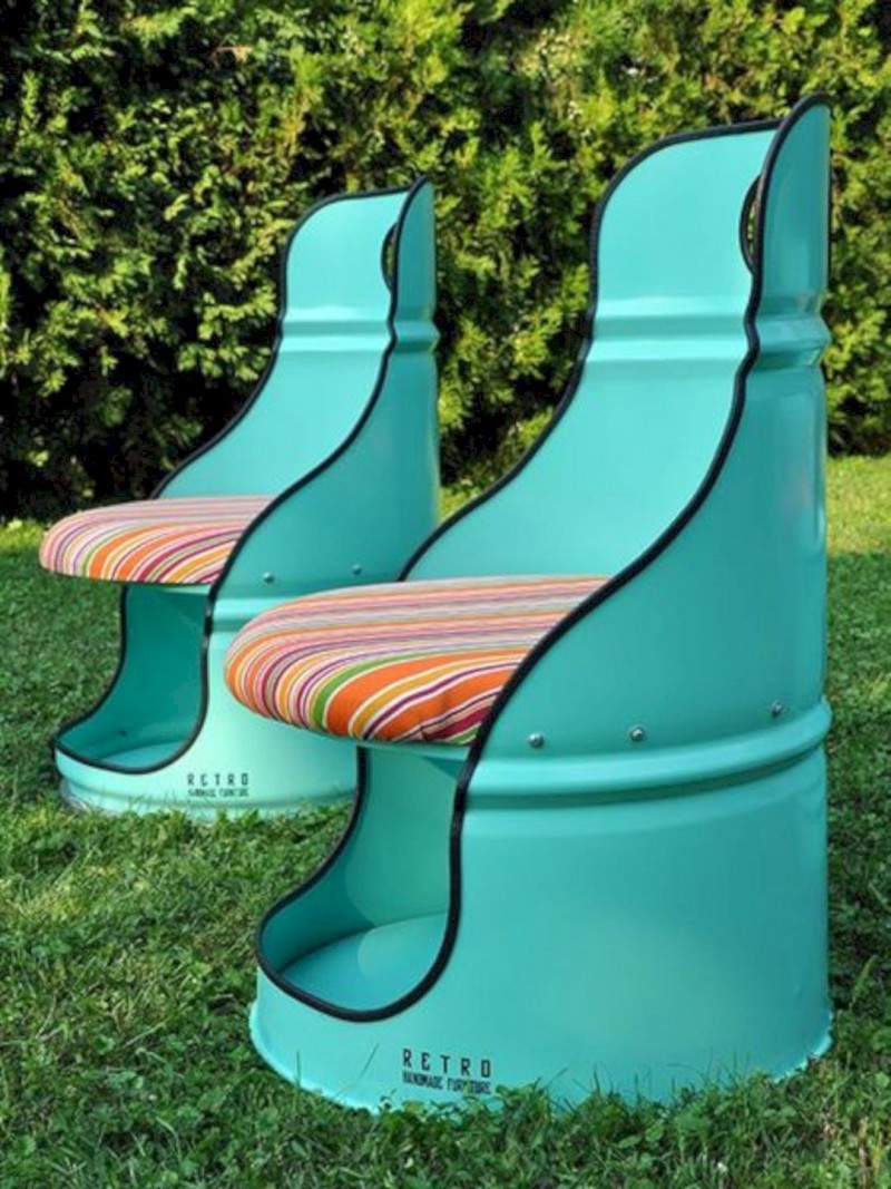 upcycled drum barrel chairs with colorful stripes cushion